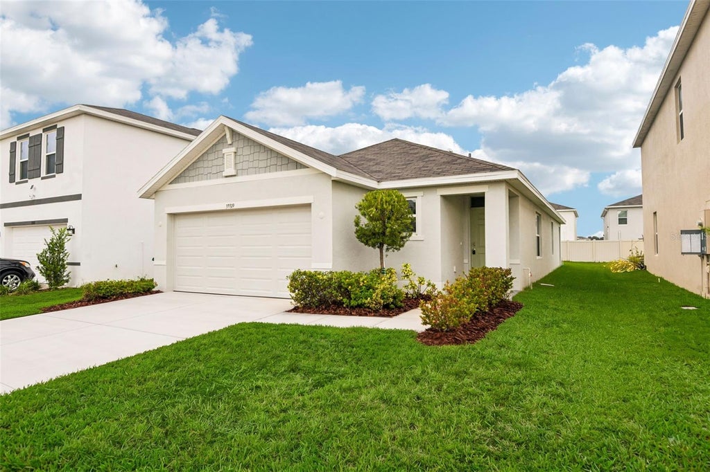 Photo of 33319 Darley Dale Trail, Wesley Chapel, FL 33545 (MLS # TB8554989)