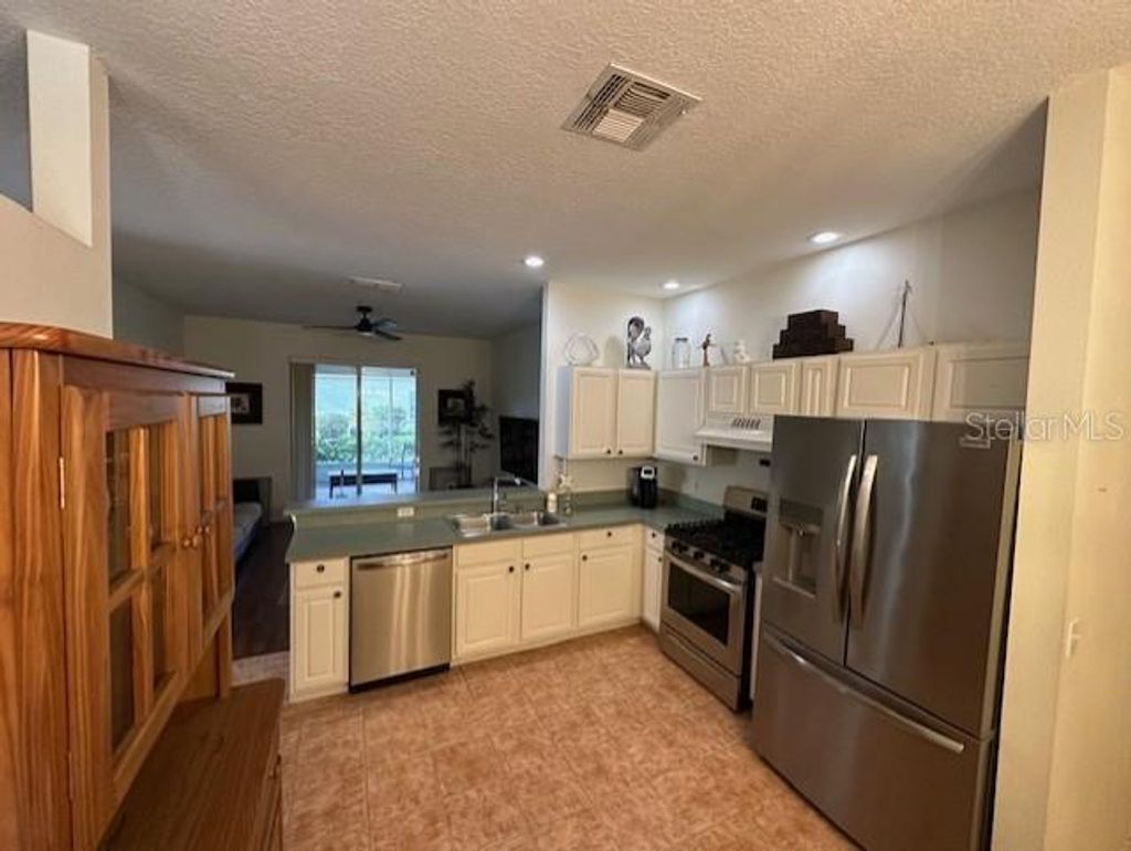 Photo of 12303 Hollybush Terrace, Lakewood Ranch, FL 34202 (MLS # O6353105)