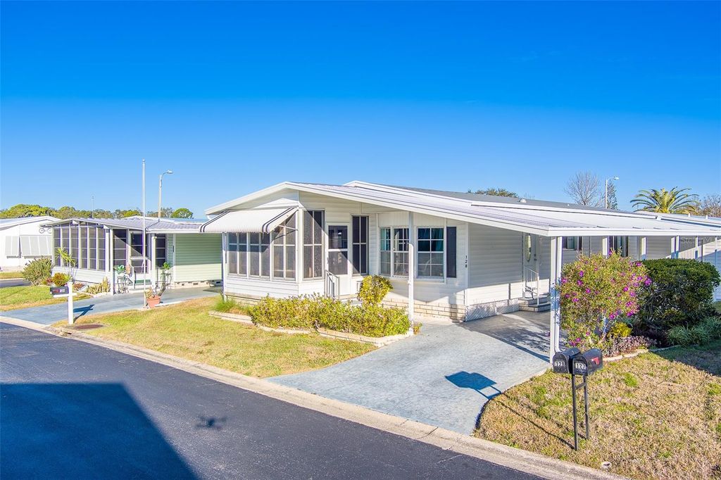 Photo of 12501 Ulmerton Road #128, Largo, FL 33774 (MLS # TB8469941)