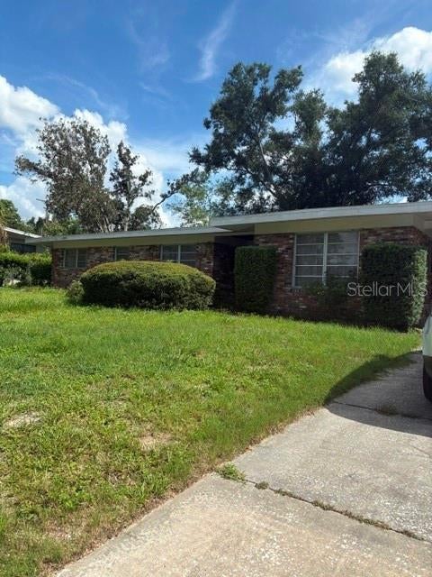 Photo of 211 Druid Hills Road, Temple Terrace, FL 33617 (MLS # TB8543423)