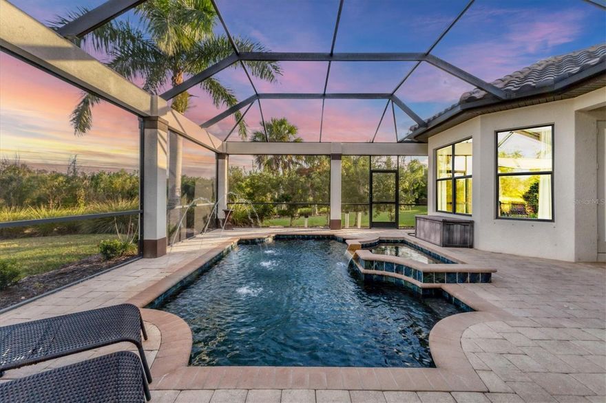 Introducing the best value in one of the most beautiful, gated communities in Sarasota located at 3519 Founders Club Drive.  Take advantage of the best and ONLY time to get into the Founders Club at this price.  Original owner who built the home with Lee Wetherington prior to the pandemic craze, this home had the best of the best vendors, contractors, and project managers who paid attention to every single detail. One of the most amazing attributes of this home is the interior homesite itself boasting half an acre of deeded, private conservation preserve in the rear and full privacy in the front of the home. The house has a very deep setback, yet still has a huge backyard. Additionally, the home is situated to have privacy on all sides which allows for total seclusion while relaxing in the pool, spa and enjoying the built in fire pit that is connected to the natural gas lines. Enjoy the rarely used and pristine outdoor kitchen while enjoying the spa which has a brand new gas heater. This house is a true four bedroom home plus an office/den all surrounding a beautiful great room with faux wood beams, spacious kitchen, stainless steel appliances, huge kitchen island, built in ovens and more!  The front room is an ensuite that is perfect for your out of town visitors.  The third bath doubles as a pool bath and guest bath.  The laundry room is adjacent to the large storage room which has so much potential as a wine room and bar.  The three car garage is enlarged to provide for additional space to house those large SUV's, toys, bikes, golf carts, etc.  Founders Club is a 24 Hour, fully manned, gated community surrounding acres upon acres of nature, wetlands, and preserve giving its residents boundless peace of mind and serenity.  Each homesite is at least 1/3 of acre providing plenty of elbow room between your lovely neighbors.  There is a wonderful recreation center with yoga classes, pilates, fitness classes, playground, sport court and tennis courts.  Membership at the Founders Club Golf Club is optional.  If you feel up to venturing outside the gates, Founders Club is less than 20 minutes to all of the incredible restaurants and beaches around the downtown areas.  Endless dining and shopping options adorn the Waterside, UTC and Lakewood Ranch areas that are just mere minutes away.  Every Sunday, Waterside has the best Farmer's Market in town boasting fresh produce, bread, craft beer, empanadas, fresh fish, and more!  You must take a moment to see the area and view this diamond in the rough - a true gem amongst multi, MULTI million dollar homes.  It represents the BEST value in the Founders Club.  Schedule your private showing today!