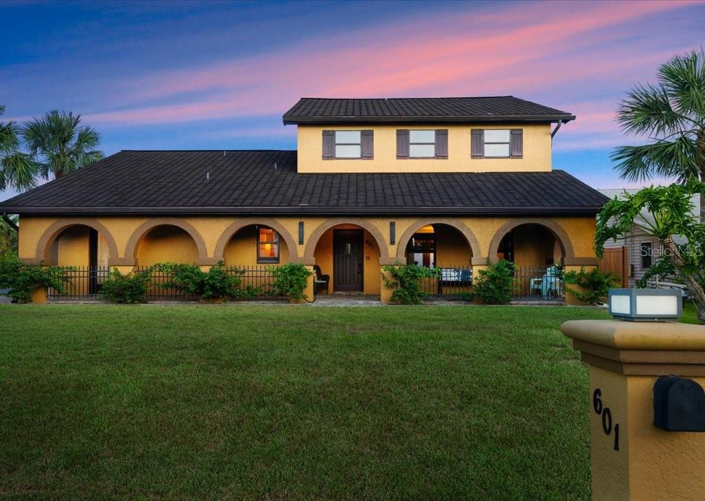 If you are a beach loving, car enthusiast that wants to fish off your deck before you jump in the pool and create cocktails behind your bar, this is YOUR house! 4 bedrooms with three connecting baths, a huge living room with soaring ceilings, well-appointed open kitchen, and even your own built-in bar create over 3000 sq ft of resort style living. When it is time to relax, retreat to the second floor to find the secluded primary suite. Complete with an office space, two walk-in closets, and gorgeous travertine tiled bath with jacuzzi tub and extra-large shower. A second wet bar with microwave and mini fridge optimizes the space creating a place to grab your coffee or a glass of wine as you exit to the amazing 40X30 rooftop deck to watch the sun rise over the Atlantic Ocean and set over the Intracoastal waterway. Whether you need room for the family or space for guests, the three main floor bedrooms, each with their own private entrance, won't disappoint. 2 more large travertine tiled baths with direct bedroom access, as well as outdoor access provide convenience and luxury. The outdoor space is the crown of this jewel! Step into the back yard paradise with brand new brick pavers, a sparkling pool, outdoor shower, and canal access to drop your Kayaks, paddleboards, or your fishing pole. Open the pass-through kitchen window to the service counter and set out beverages and snacks for the ultimate party. But wait, there's more. Venture down the "pirate vibe" courtyard to a dramatic, large wooden door that will lead you out front, or take a turn into your dream garage. This oversized, three-car garage has all the things! Its own bathroom, an entire functioning kitchen, storage for days, workshop, and yes, a CAR LIFT! In addition to the bells and whistles, this fabulous home also comes with peace of mind! Both HVAC units were replaced in 2024. The roof is comprised of 1/2-barrel shaped composite shingles that resemble tiles. Whole house Central Vac system. Flood Zone X500. No HOA.
Historic Flagler Beach truly is a "step back in time." A quaint dog-friendly beach town where your golf cart is the favored method of getting around to the local shops and restaurants, the monthly First Friday celebration, weekly farmers market, and the annual holiday parades. Square footage received from tax rolls. All information intended to be accurate but cannot be guaranteed.