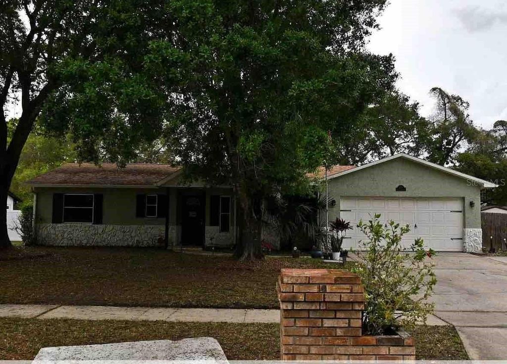 Photo of 1323 Sweetwood Boulevard, Kissimmee, FL 34744 (MLS # O6365642)