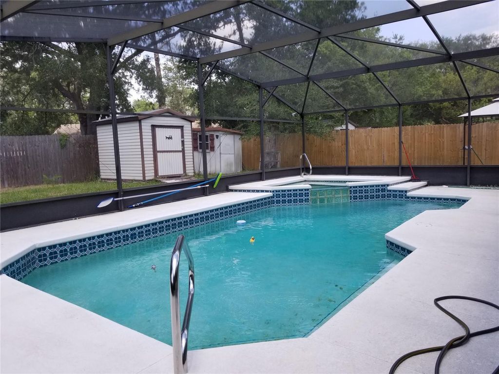 Photo of 1323 Sweetwood Boulevard, Kissimmee, FL 34744 (MLS # O6365642)