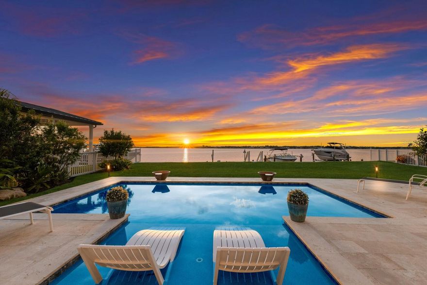 Hurricane Impact Windows and Doors! 2021 Construction! No storm damage! Step into unparalleled waterfront living with this exclusive contemporary estate, perfectly situated on a private gated peninsula along the Manatee River called The Reserve at Harbour Walk. Nestled behind the esteemed double gates, this exceptional 2021-built home features a private boat dock with DIRECT ACCESS to the Gulf of Mexico. As you enter through the elegant double glass doors, you are immediately greeted by breathtaking, unobstructed water views. The grand two-story living room captivates with its modern design, highlighted by a floating staircase and a harmonious blend of high-end style and relaxed luxury. The Owner’s Retreat is a true haven, offering stunning water views and a walk-in closet with its own washer/dryer. The master bath is a luxurious escape with premium counters, flooring, and separated dual sinks. Upstairs, you'll find three additional bedrooms, two full bathrooms, and a generous bonus room complete with a wet bar, ideal for entertaining and watching amazing sunsets. This home, boasting 5 bedrooms, 4 bathrooms, a separate private office, and two expansive lanai areas, provides ample space for family and guests. Sunlight floods the open living spaces through tall, expansive impact-glass windows, creating a seamless connection between indoor and outdoor areas. Hurricane-impact sliding glass doors pocket away to merge the living spaces with the outdoors, making entertaining effortless. Enjoy the serene beauty of dolphins, manatees, and diverse wildlife right from your backyard, and marvel at the spectacular sunsets from your outdoor living areas. BRAND NEW SEAWALL, BRAND NEW DOCK, BRAND NEW LANDSCAPING! The home’s prime location offers quick access to the Intracoastal Waterway and Gulf of Mexico, with convenient fuel stops and dining options along the waterway. The Reserve at Harbour Walk is a distinguished community with a guarded entrance, an additional set of gates, tennis courts, a playground, a walking trail, a kayak launch, and an observation pier. This exceptional property combines the allure of direct-open water living with proximity to I-75, UTC Mall, diverse restaurants, shopping, pristine world-famous beaches, three major airports, and IMG Academy. Don’t miss this rare opportunity to own a slice of waterfront paradise.