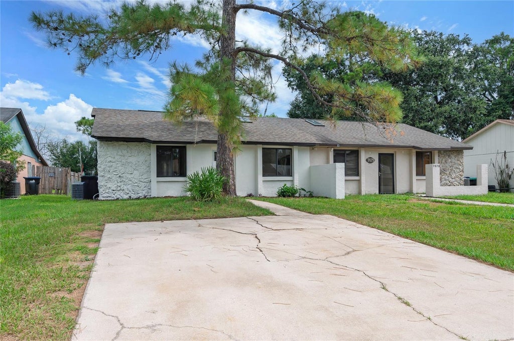 Photo of 7681 Timber River Circle, Orlando, FL 32807 (MLS # O6436745)