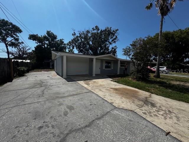 Great 2 bedroom/1 bathroom home with a carport for rent in New Port Richey less than 5 miles away from multiple restaurants, grocery stores, shopping centers and everything else you need! Central ac. NO utilities or lawn maintenance included. REQUIREMENTS: First and Last month's rent plus $1450 Security deposit is required before move-in. 1 year min lease term. Applicants must have a credit score of 600 or more and monthly income of $4350. No smoking is permitted. Pets are allowed with landlord approval and $250 Non-refundable pet fee for each pet. Tenant responsible for appliances.