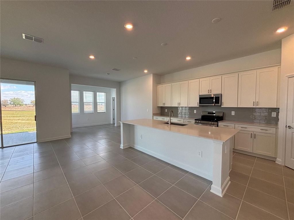 Photo of 5996 Shavasana Road #A, Clermont, FL 34714 (MLS # O6392599)