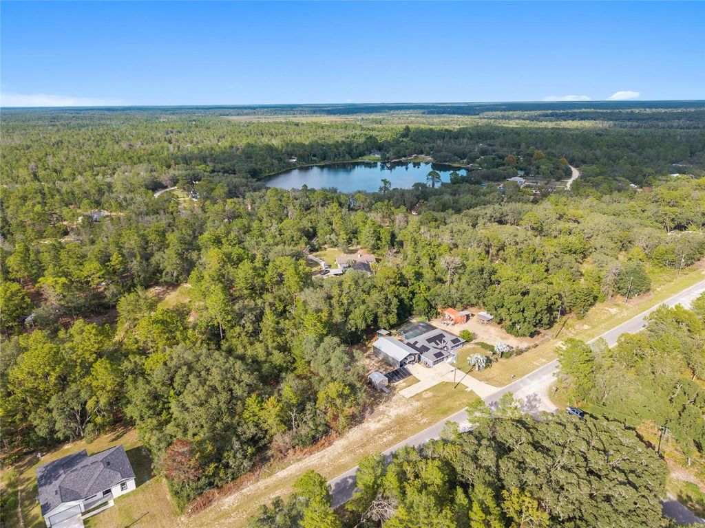 Photo of Tbd Fisher Way, Ocklawaha, FL 32179 (MLS # OM710172)