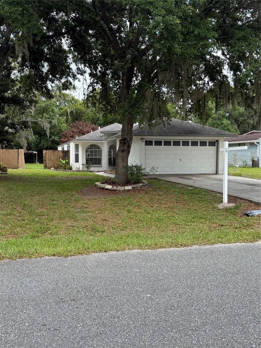 Location is everything! This charming 3-bedroom, 2-bath home is ideally situated near distance  elementary school, recreation center, library, popular restaurants, and a variety of shopping destinations. The home offers a comfortable and functional layout with spacious living areas. Step outside to enjoy the fenced backyard, perfect for family activities, pets, or entertaining guests. Conveniently located near top local amenities, schools, shopping, dining, and entertainment, this home offers the perfect blend of comfort and convenience.
Roof 2012 and new hot water heater. All new vinyl floors just installed and whole house painted. No HOA or CDD!
