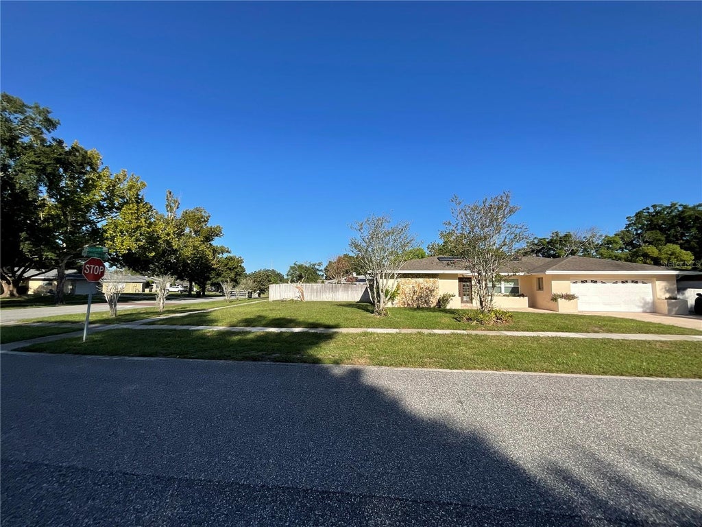 Photo of 6004 Hardrock Circle, Orlando, FL 32819 (MLS # O6443454)