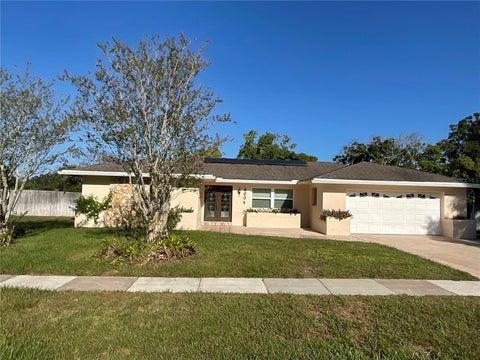 Photo of 6004 Hardrock Circle, Orlando, FL 32819 (MLS # O6443454)