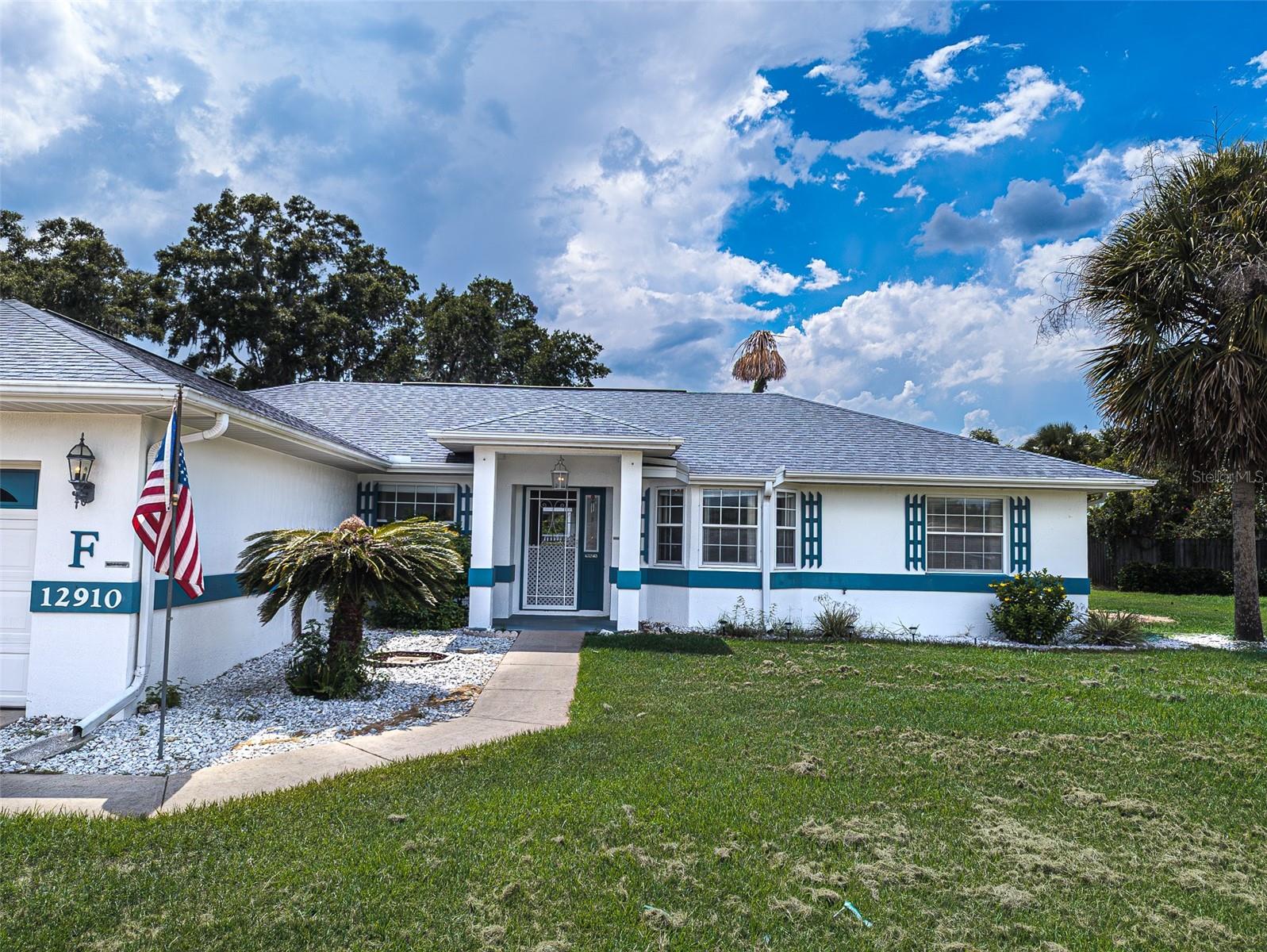 Absolutely Beautiful 3BR/2BA home on oversized 0.51-acre lot in sought-after Belleview! Features vaulted ceilings, open floor plan, oversized primary walk-in closet, and spa-style jetted tub. Light-filled living areas flow into kitchen and dining—perfect for entertaining. Garage includes a custom workshop space ideal for hobbies, storage, or projects. Enjoy a charming gazebo, mature landscaping, and a peaceful, secluded neighborhood. Prime location just minutes to downtown Belleview and within 10 minutes of medical facilities, shopping, dining, and entertainment. Close to Lake Lillian with walking trails, fishing dock, picnic pavilions, and community events. Near Belleview Sports Complex with 80 acres of recreation. Easy access to Ocala, The Villages, and major highways. This home offers indoor comfort, outdoor beauty, functional workspace, and unbeatable convenience—schedule your showing today!