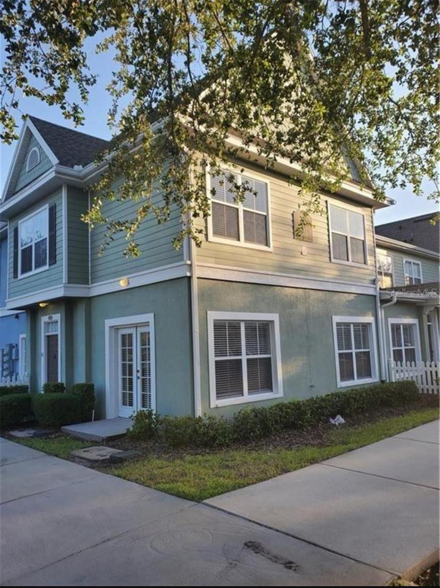 READY TO MOVE !! UPDATED IN 2020, new wood kitchen cabinets, Italian granite kitchen countertops, new tile titles in downstairs living room, NEW STEEL APPLIANCES. SEE ATTACHED FEATURES SHEET. CORNER UNIT. 4 bedrooms, 3 bathrooms, TWO MASTER SUITES. 1 master on the ground floor AND 1 master on the upper floor. The downstairs master bathroom has been completely remodeled in 2023. The great room has French doors, The air conditioning has been changed approximately 1 year; This beautiful townhouse can be a short term rental or a main home. Conveniently located near schools, restaurants, theme parks, shopping and major highways. Venetian Bay is a 24 hour guarded community offering resort style amenities: 4 swimming pools (main pool is heated), sun deck, 4 children's play areas, clubhouse with kitchen, fitness center, game room, volleyball sand, basketball, tennis courts, picnic areas, fishing. dock and more. This gem won't last long. Call today for your private showing!O MOVE !!!