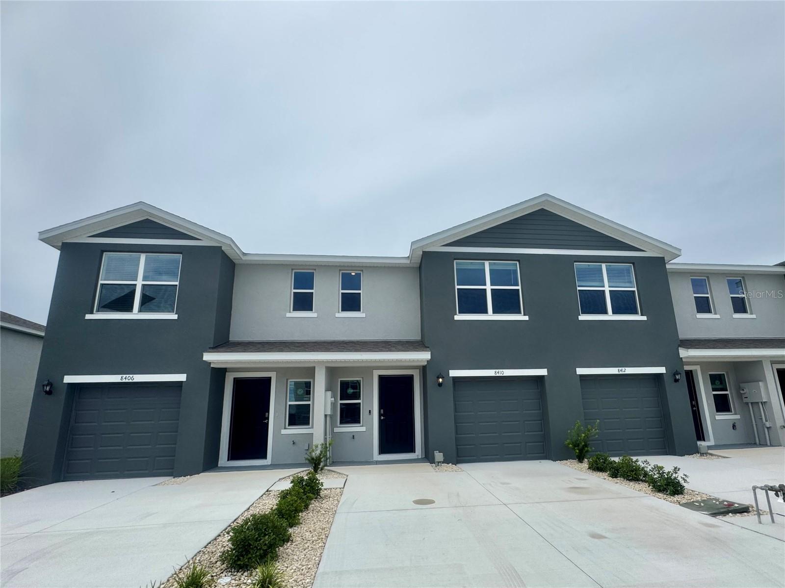 This 3/2 and a half brand-new two-story townhome features an open-concept downstairs layout that includes a large kitchen, a powder room, and a spacious family room overlooking a patio. The second floor has a spacious primary suite with an ensuite bathroom, two additional bedrooms, a second full bathroom, and a laundry area. This home comes with all appliances, including a refrigerator, built-in dishwasher, electric range, microwave, washer, and dryer.