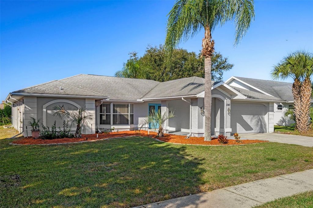 Photo of 1542 Overland Drive, Spring Hill, FL 34608 (MLS # TB8460069)