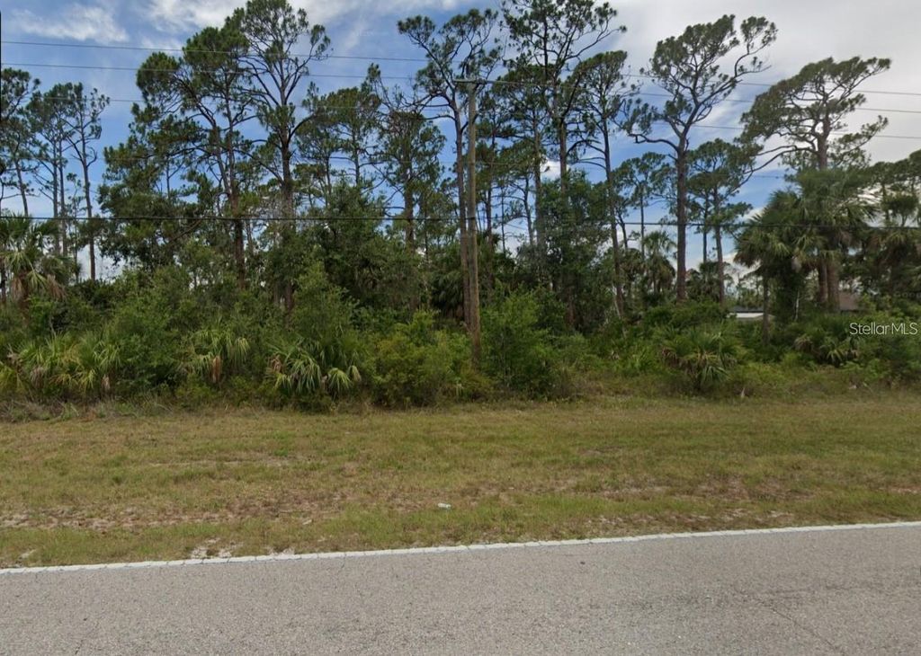 Photo of 4073 Collingswood Boulevard, Port Charlotte, FL 33948 (MLS # O6390182)