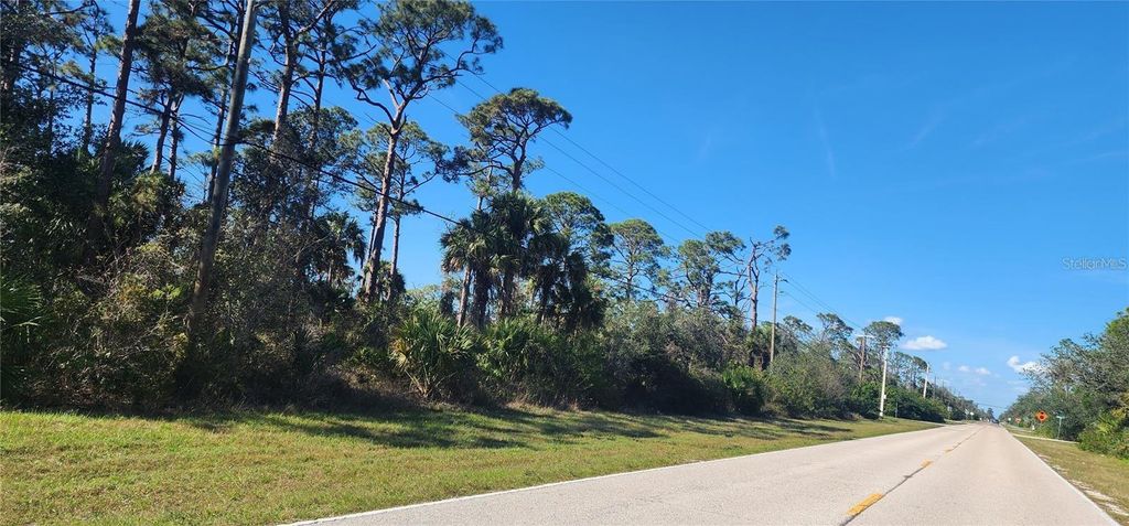 Photo of 4073 Collingswood Boulevard, Port Charlotte, FL 33948 (MLS # O6390182)