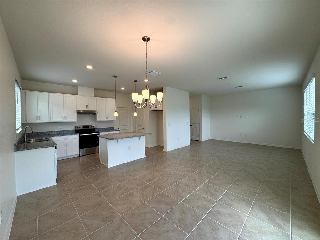 Photo of 3138 Sanctuary Drive, Clermont, FL 34714 (MLS # O6438068)