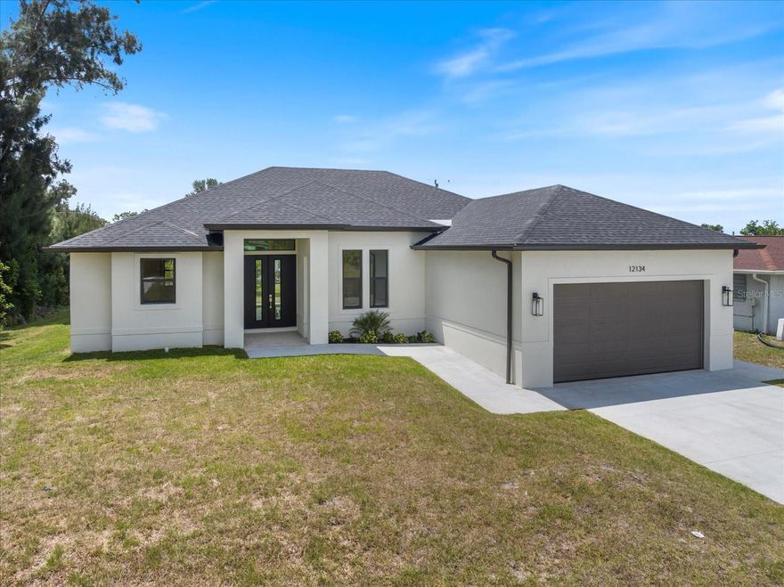 Located in the highly desirable area of North Port and very close to the world-famous Warm Mineral Springs, this stunning new construction home offers the perfect combination of luxury, comfort, and modern design. With over 1,900 square feet of living space, this beautifully built residence features 3 spacious bedrooms, 2 full bathrooms, and a flexible den/office space that can easily be used as a home office, playroom, or guest room.

Step inside to an inviting open floor plan with tall ceilings and elegant finishes throughout. The home showcases custom tile work and tile flooring throughout the entire home, creating both style and easy maintenance. The spacious living and dining areas flow seamlessly into the kitchen, making this home ideal for entertaining and everyday living.

The kitchen is designed to impress with gorgeous quartz countertops, solid wood cabinetry, ample counter space, and modern finishes that bring both beauty and functionality together. The large master suite serves as a private retreat, featuring two walk-in closets and a luxurious en-suite bathroom complete with a soaking tub, walk-in shower, and double vanity setup.

Enjoy Florida living from the covered lanai, perfect for relaxing mornings or evening gatherings. Conveniently located near shopping, dining, parks, schools, and just a short drive to Gulf beaches, this home offers the ideal blend of peaceful living and accessibility. Don’t miss the opportunity to own a beautifully crafted new construction home in one of Southwest Florida’s fastest-growing communities.