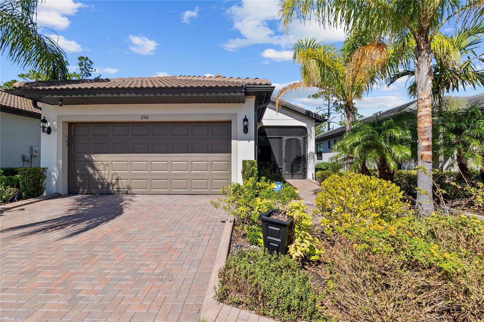 As the temperatures drop and the skies turn to the never ending shade of grey in the North, you will be sharing selfies lounging poolside or pictures of our amazing sunsets. The only thing you will find frozen here are the drinks. The sunny skies and mild temperatures are motivation for an active Winter. This meticulously styled home is located in the 55+ community of Cypress Falls enriched with amenities and endless opportunities to socialize . Your neighbors will become fast friends and a friendly, or perhaps not so friendly, pickleball match will ensue. Tennis, basketball, scenic jogging paths, fitness center and state of the art pool area that stays at a comfortable temperature year round are right at hand. For your time indoors, this gorgeous home with thoughtful touches, will provide the perfect setting to an amazing winter holiday. Well stocked with all the modern conveniences of home, you can pack lightly. Your love of cooking will return in this updated kitchen looking out upon the dining and living room with a perfect view to the preserve that lies just outside the lanai. The living area is comfortably designed and a warm ambiance is created with the electric fireplace. For those working remotely, there is a dedicated office space with strong Wi-Fi . Now I lay me down to sleep in King sized bedding for bedding for a restful night's sleep. The attached bathroom has dual sinks and a walk in shower. No fighting over space here. The guest bedroom has a Queen sized bed which offers equal comfortability. Perfect for guests or perhaps two couples wishing to share space. The evenings and mornings are perfect for a moment of reflection on the screened lanai. The preserve provides a peaceful backdrop and the sounds of Mother nature will soothe your mind. A day at the gorgeous Gulf Beaches in both Venice or Manasota Key are a quick car ride away. Perfect for shelling, shark tooth hunting or just enjoying some well deserved salt therapy. Plenty of great dining and retail options close at hand. We look forward to hosting you this Winter and you will surely be asking to book Winter 2026 before you go!
