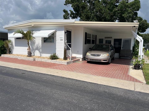 Photo of 142 Fern Palm Street, Largo, FL 33778 (MLS # TB8532974)