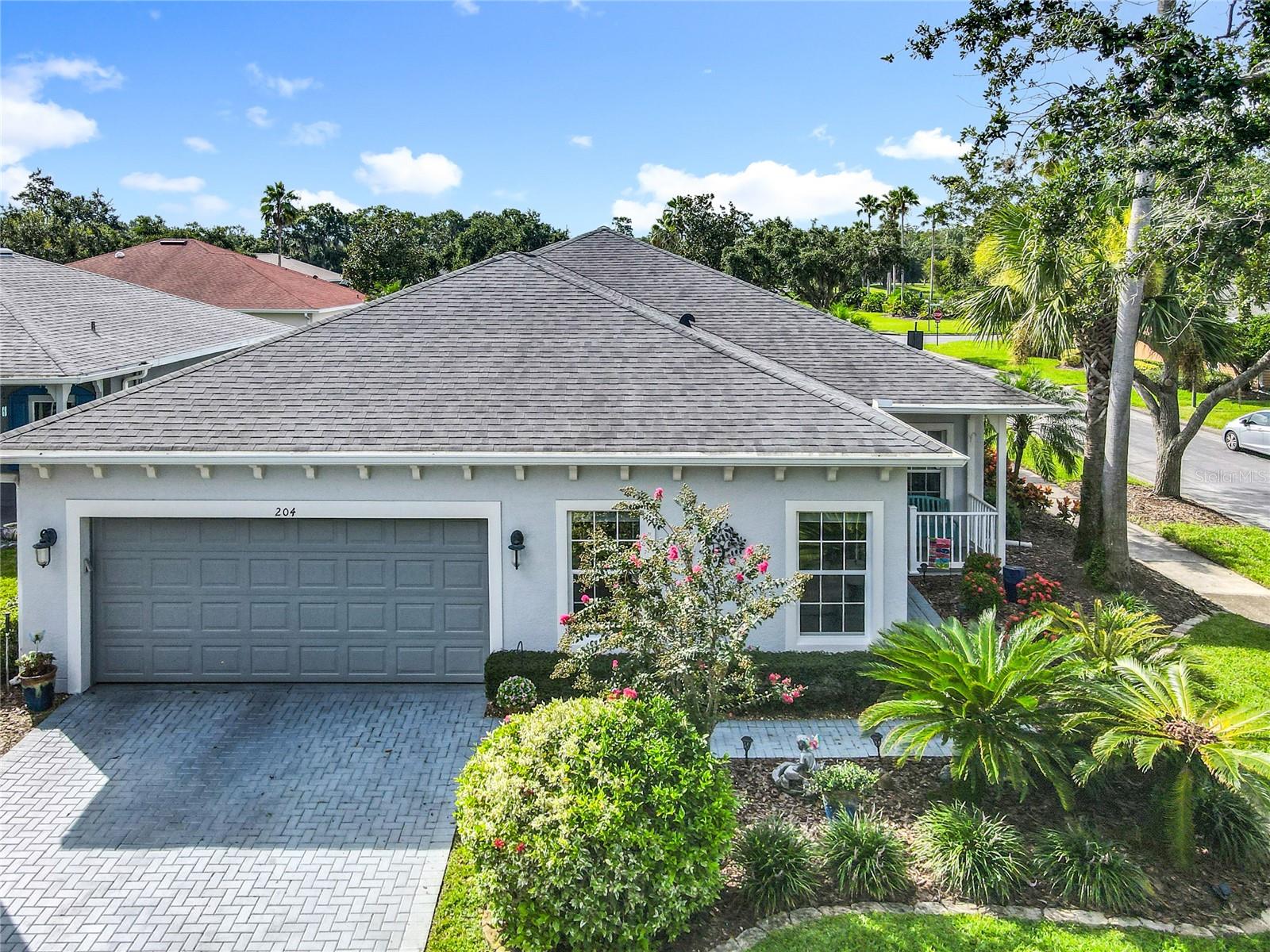 Exquisitely Upgraded Harmony Model in a Prime Location
Nestled on a desirable corner lot just steps from the community pool, this stunning home offers the perfect blend of luxury and convenience. Enjoy upscale living in a setting that is as vibrant as it is serene. OPEN CONCEPT LIVING!! From the moment you arrive, this pristine retreat captivates with over $50,000 in thoughtfully curated upgrades. Step through the elegant leaded glass front door and experience the elevated finishes and high-end enhancements that make this stunning home truly exceptional. Boasting two spacious bedrooms, two bathrooms, a versatile flex room, and a chef-inspired kitchen with upgraded finishes and everything of which you have dreamed. Enjoy the richness of NEW tile flooring, a NEW roof (2017), NEW water heater (2020), and 1,822 sq. ft. of meticulously maintained interior space, expanding to 2,487 sq. ft.. Additional upgrades and ATTIC RE-INSULATION (2023) provide both comfort and energy efficiency year-round. The Heart of the Home is a beautifully upgraded kitchen, thoughtfully designed for both style and functionality. Featuring granite countertops, new stainless-steel appliances, and new flooring, undermount sink, bright cabinetry, and pendant-lit breakfast bar create a welcoming atmosphere, complemented by a spacious breakfast nook that doubles perfectly as a cozy craft room or sunlit workspace. A Dream Owner’s Suite. Step into a haven of comfort and elegance, where new flooring, a spacious walk-in closet, and a dedicated reading nook invite quiet moments of relaxation. Enjoy direct access to your private lanai, the perfect setting for morning coffee or serene al fresco dining. Prepare to be wowed by the completely EN-SUITE upgraded primary bathroom luxurious space featuring a garden tub, new cabinetry, dual sinks, a walk-in shower with a built-in bench, and a discreet water closet for added privacy. Two Car Garage, Inside Laundry Room, Outdoor Living at Its Finest The expansive screened lanai offers the perfect backdrop for memorable family gatherings and lively evenings with friends. Whether you are hosting weekend barbecues or simply unwinding in the peaceful surroundings, this tranquil haven elevates outdoor living to a new level. Gated Golf Community of Solivita offers an impressive array of amenities, two PGA 18-holes Championship golf courses, two State of the Art Amenity Centers, fourteen pools, restaurants, tennis court, playground, dog park, and over two hundred different clubs. Near supermarkets, restaurants, pharmacies, hospital, new express way, just 25 minutes to major attractions, and the new Sun Rail Poinciana Station. If you are interested in the property, it is a clever idea to schedule a video virtual showing or arrange for a private showing to see it in person. A physical tour can provide a better sense of the space, layout, and overall feel of the property.