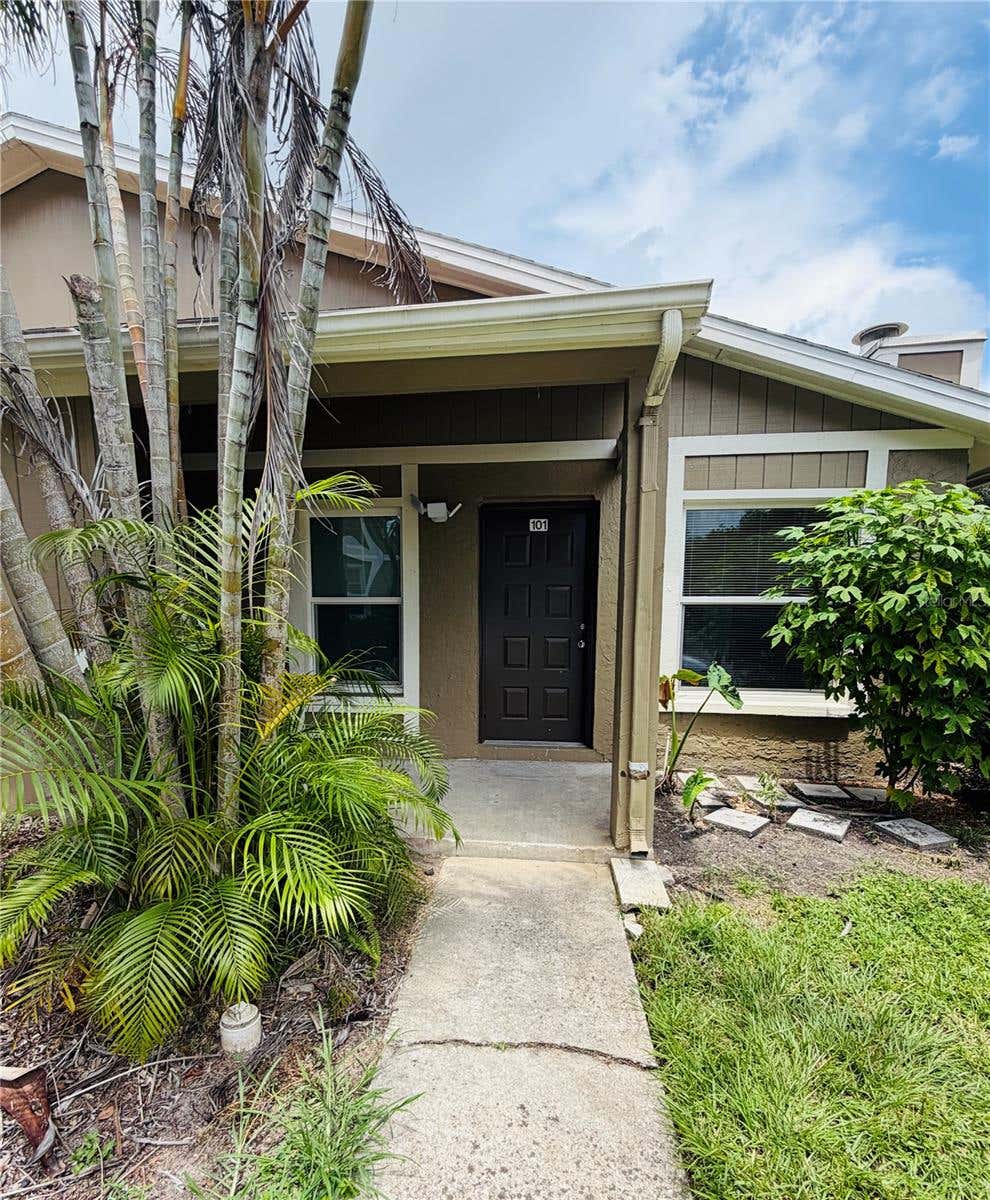 Photo of 14311 Hanging Moss Circle #101, Tampa, FL 33613 (MLS # TB8526092)