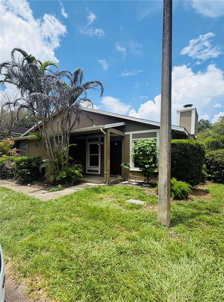 Photo of 14311 Hanging Moss Circle #101, Tampa, FL 33613 (MLS # TB8526092)