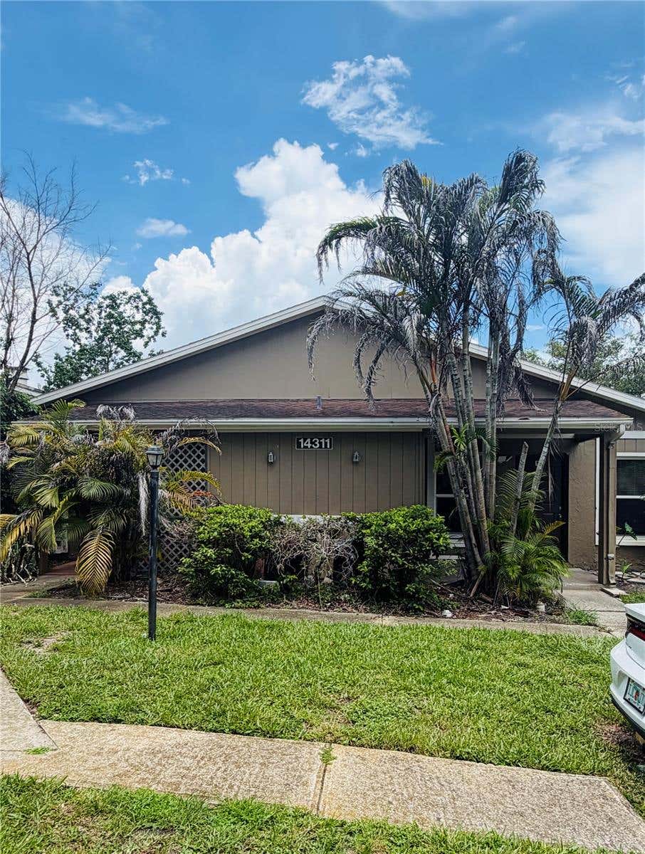 Photo of 14311 Hanging Moss Circle #101, Tampa, FL 33613 (MLS # TB8526092)