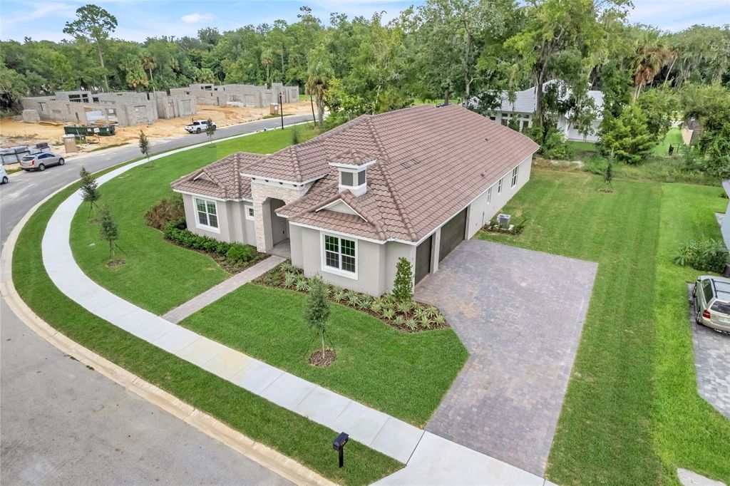 Photo of 106 New Leatherwood Drive, Palm Coast, FL 32137 (MLS # O6352088)
