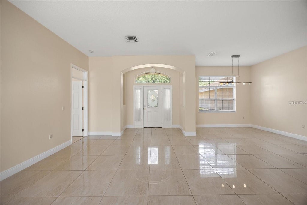 Photo of 1376 Shelter Rock Road, Orlando, FL 32835 (MLS # O6448586)