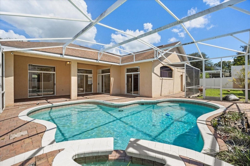 Photo of 1376 Shelter Rock Road, Orlando, FL 32835 (MLS # O6448586)