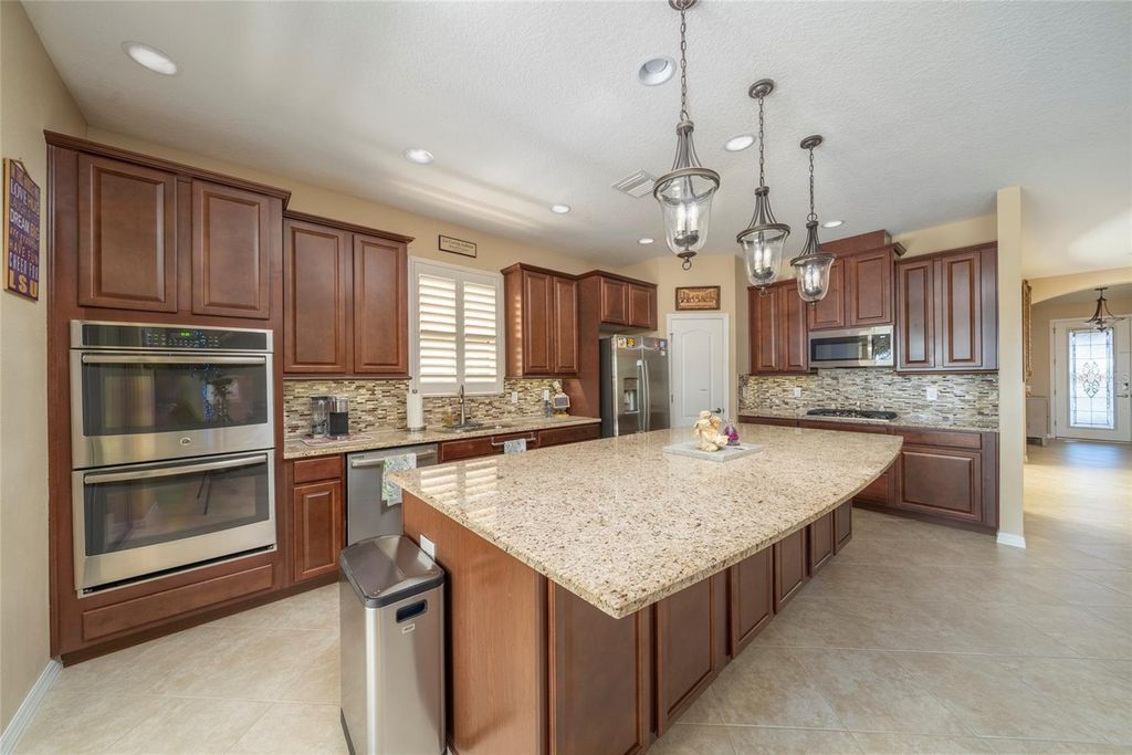 Photo of 1023 Timbervale Trail, Clermont, FL 34715 (MLS # G5104395)