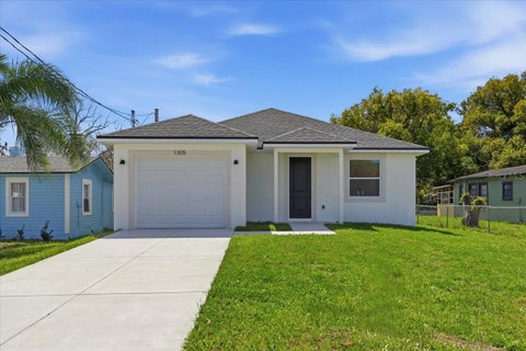 Photo of 1305 E Parker Street, Lakeland, FL 33801 (MLS # TB8561255)