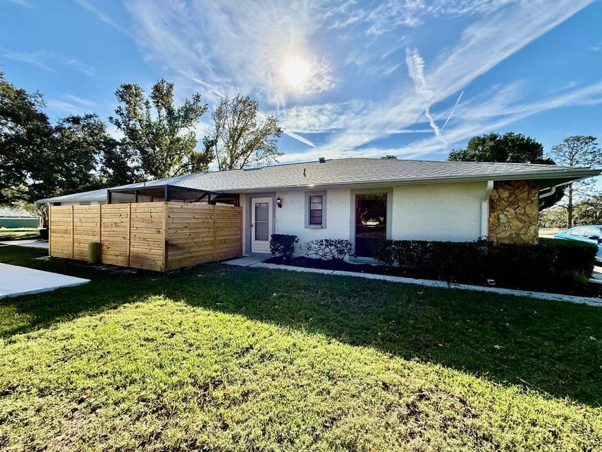 Welcome to this charming 2-bedroom, 2-bath home with a one-car garage located in the highly sought-after Club Villas community in Land O Lakes. Step inside to find stunning high ceilings, ceiling fans, and an open, airy floorplan that fills the home with natural light. The chefs dream kitchen features stainless steel appliances, granite countertops, and ample cabinetry, offering both style and functionality. The home boasts ceramic tile throughout, providing a modern look and easy maintenance. Relax or entertain outdoors on the screened-in lanai patio, perfect for enjoying Florida's beautiful weather. For your convenience, sewer, water, trash, and lawn care are all included in the rent. A washer and dryer are also included, along with additional in-home storage. Located close to major highways, shopping, dining, and entertainment, this home offers comfort, convenience, and an exceptional lifestyle. For $40/month tenant can enjoy amazing amenities such as a community pool, playground and tennis courts. In addition to the advertised base rent, all residents are enrolled in the Resident Benefits Package (RBP) for $50.00/month which includes HVAC air filter delivery, credit building to help boost your credit score with timely rent payments, utility concierge service making utility connection a breeze during your move-in, and much more! More details upon application. Pets welcome, 2 max, 50 lbs. Vacant and Available now!