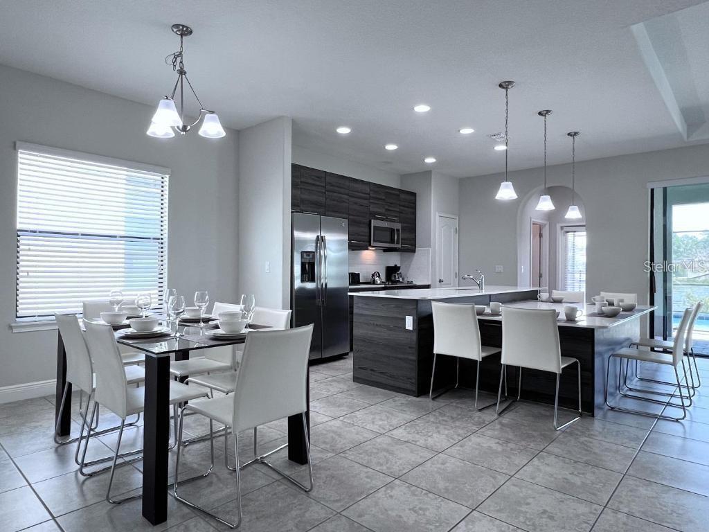 Photo of 140 Angelas Avenue, Haines City, FL 33844 (MLS # O6451436)