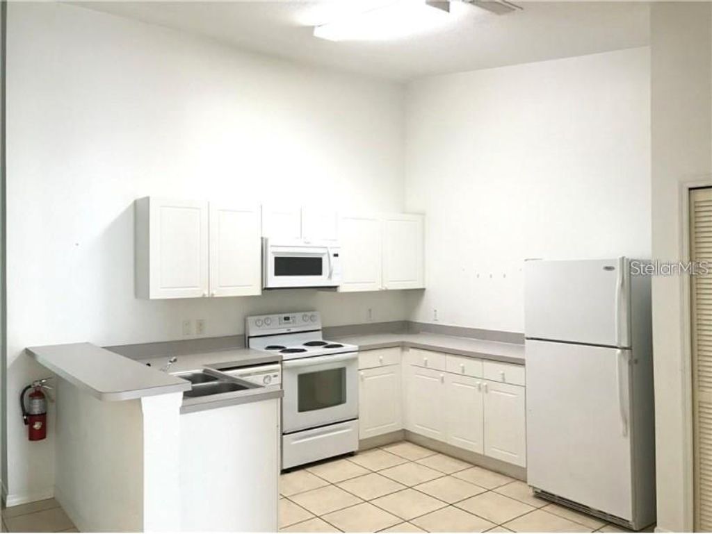 Photo of 2792 Club Cortile Circle #B, Kissimmee, FL 34746 (MLS # O6397805)