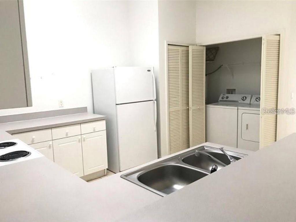 Photo of 2792 Club Cortile Circle #B, Kissimmee, FL 34746 (MLS # O6397805)