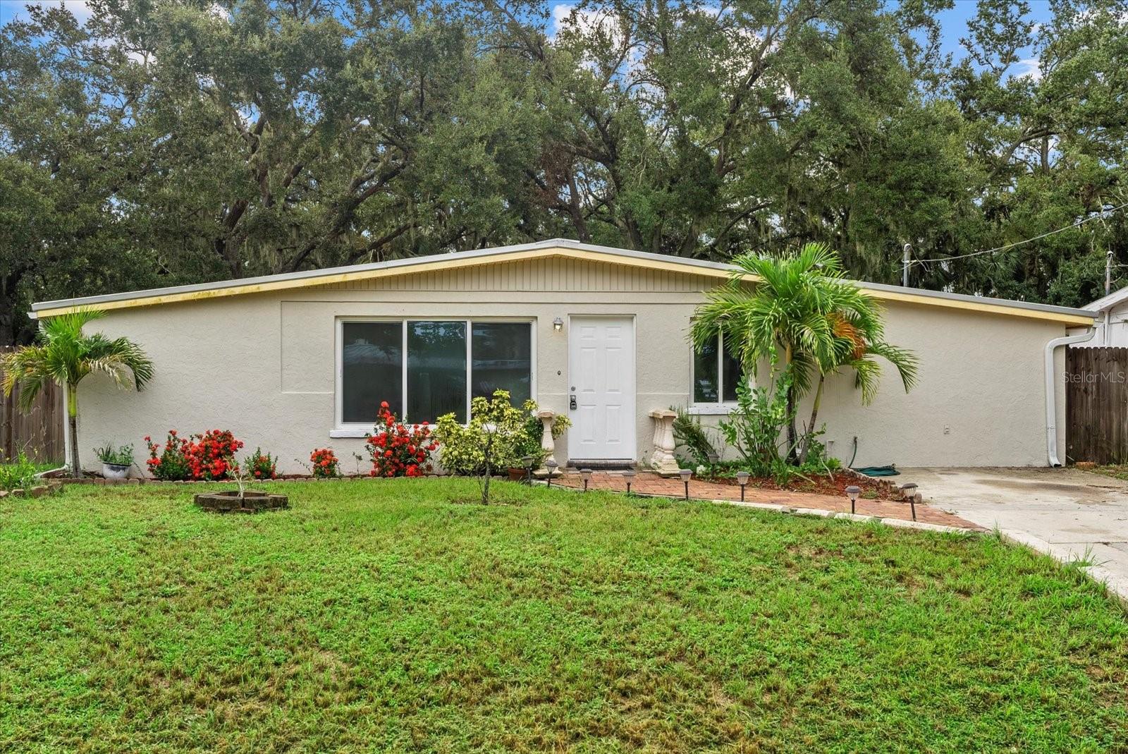 Renovated 3 Bedroom / 2 Bath Sarasota Home – No HOA! Move-in ready and fully updated, this 3-bedroom, 2-bath home offers modern living in a central location of Sarasota. Recent renovations include NEW kitchen with granite countertops, cabinetry, and appliances, NEW bathrooms with new tile work and fixtures, NEW tile plank flooring throughout, updated electrical, and NEW GPT windows. Plus, the BRAND NEW metal roof provides long-term value and peace of mind. The versatile master suite features a private entrance and full bath, making it ideal as an in-law suite, guest retreat, or rental opportunity. Enjoy a spacious, living area with lots of natural light and a large fenced backyard perfect for pets or entertaining on the weekends. Located minutes from I-75, downtown Sarasota, the YMCA, shopping, hospitals, parks, and Gulf beaches, plus the local park and elementary school are just down the road. With NO HOA fees, you’ll enjoy the freedom of true homeownership in a central location of Sarasota!