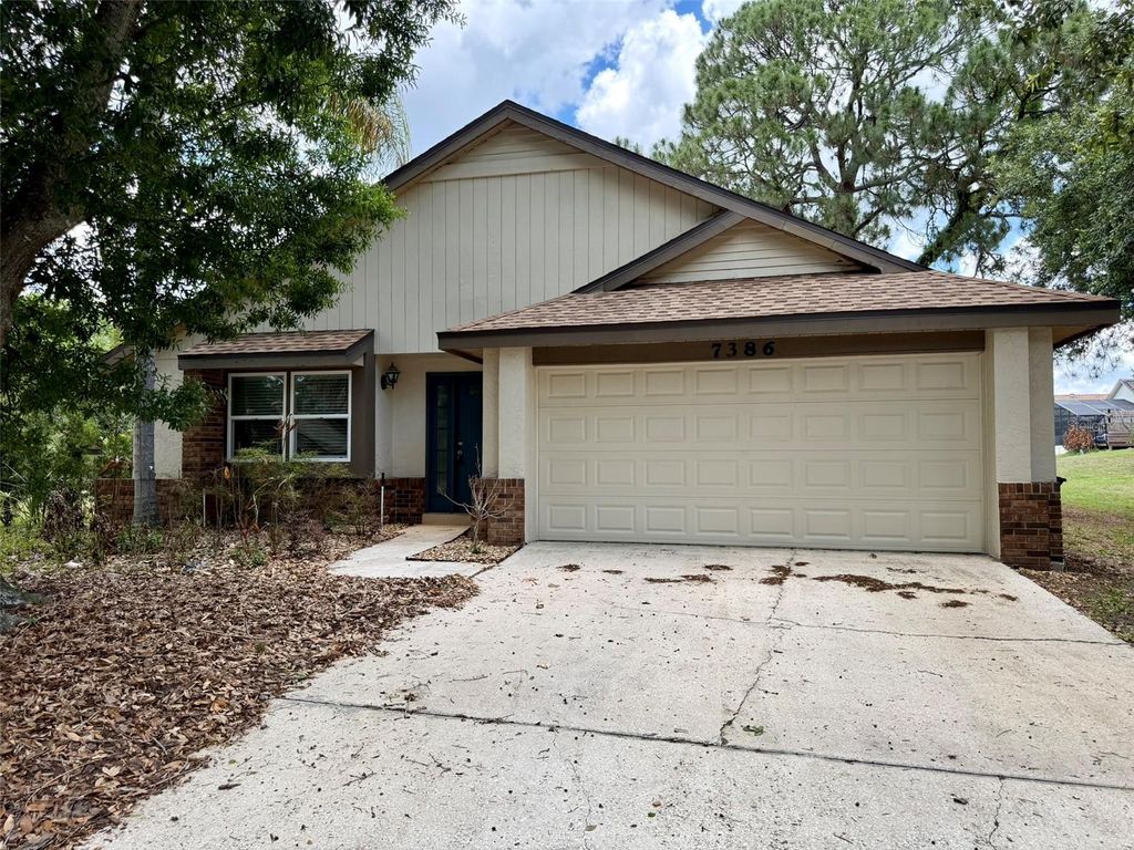 Photo of 7386 Spring Villas Circle, Orlando, FL 32819 (MLS # O6409224)