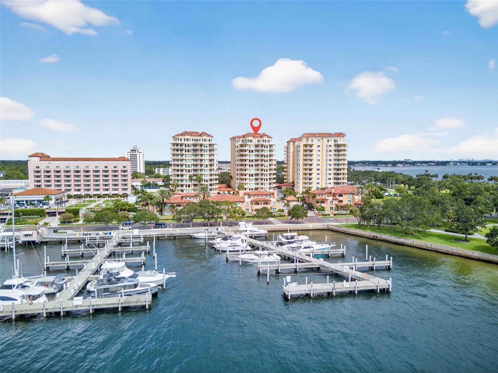 Welcome to Vinoy Place, an exclusive condominium enclave beside Tampa Bay and vibrant downtown St. Petersburg. This exceptional residence features one of the largest wrap-around balconies in the community, offering expansive outdoor living with city skyline views, peek-a-boo views of the Vinoy Basin, and an overlook of the resort-style pool.
Your elevator opens directly to your own foyer, providing a discreet and elegant entry into this bright, open floor plan with walls of windows and a spacious great room. The gourmet kitchen features premium Sub-Zero and Viking appliances, abundant storage, and a casual dining area. The flexible “Vinoy Room” offers additional space ideal for TV viewing, a den, or a home office. Also as a added bonus there is a full house filtration and water softening system.
The primary suite offers a private terrace, large walk-in closet with custom organizers, and a spa-like bath with soaking tub and separate shower. A second en suite bedroom, powder room, and laundry room complete the layout.
Vinoy Place offers two pools, outdoor kitchens, club and game rooms, a fitness center, 24/7 staffed gate, on-site management, and guest parking in addition to two assigned garage spaces. Your home also has loads of extra storage closets and your own trash chute located in the private foyer.
Just steps from Beach Drive, the Pier, museums, dining, and waterfront parks, this home combines luxury, privacy, and location — with a one-of-a-kind terrace that sets it apart from every other unit in Vinoy Place.