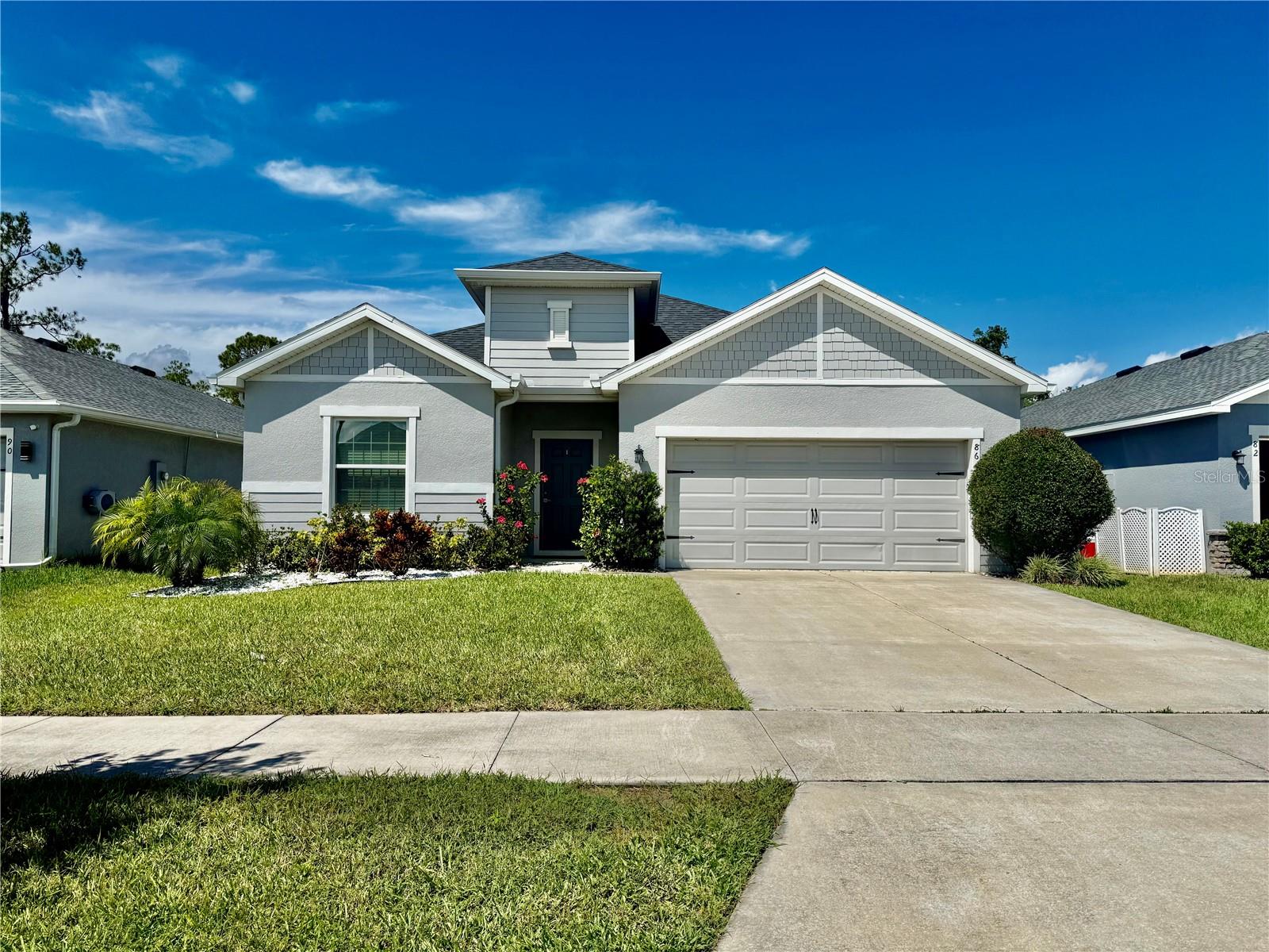 Stunning Highland Homes move-in ready and available now! Lawn Care INCLUDED with Rent! This 3 year old home offers 2,020 sq. ft. of one-story living space with 4 bedrooms, 2.5 baths, and a 2-car garage. Located in a desirable St. Cloud community, zoned for AMAZING SCHOOLS and just minutes from Lake Nona!! Step inside to an open-concept floor plan designed for modern living. The gourmet kitchen features shaker cabinets, granite countertops, Samsung stainless steel appliances, a walk-in pantry, and a spacious counter-height island overlooking the dining café and gathering room. The owner’s suite is GINORMOUSE, a true retreat with a walk-in closet and en-suite bath complete with dual vanities, a tiled shower, spa tub, and closeted toilet. Bedrooms 3 and 4 enjoy a convenient Jack-and-Jill bath with an enclosed tub and toilet. A separate half bath makes entertaining easy. Stylish finishes include luxury wood vinyl plank flooring in the main living areas, baths, and laundry room, plus stain-resistant carpet in bedrooms. Enjoy Florida living outdoors with your covered lanai and beautifully landscaped yard that will be maintained YEAR ROUND; included WITH Rent! This home stands out for its premium upgrades, professional landscaping service, and unbeatable condition!! Schedule your showing today and make this exceptional Shelby model your next home.
