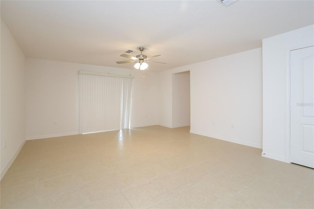 Photo of 1661 Hideaway Flat Street, Mascotte, FL 34753 (MLS # O6357099)