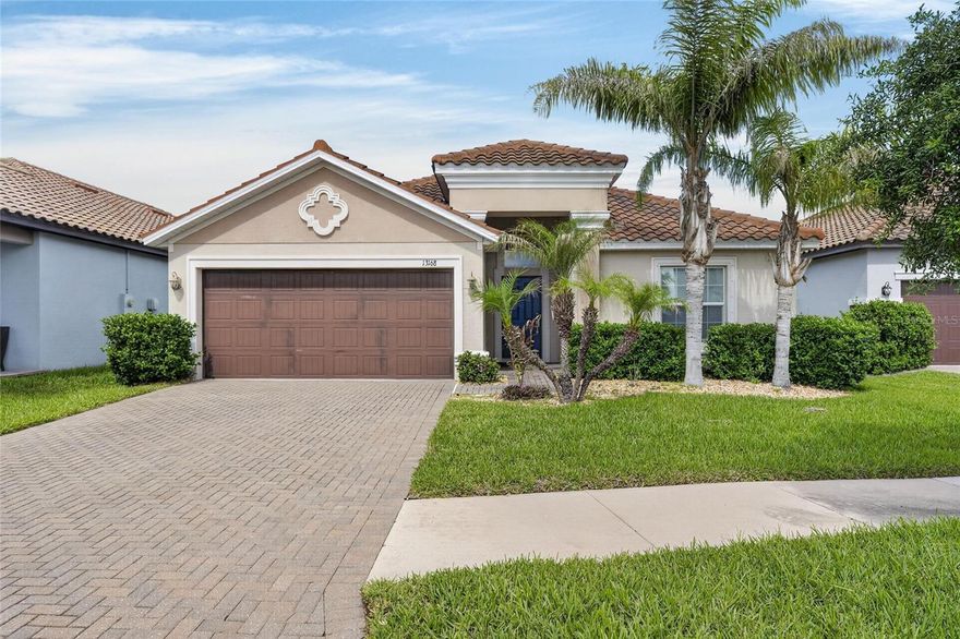 Step into a home that delivers space, style, and the kind of everyday comfort buyers are looking for. This single-level residence offers 4 bedrooms, 3 bathrooms, and 1,930 square feet of heated living space, creating a layout that feels open, functional, and ready for real life. Built in 2018 with stucco construction, a tile roof, and a slab foundation, the home brings together modern fundamentals and easy Florida living. Inside, the open floor plan sets the tone immediately. High ceilings create an airy feel, while the living room, kitchen, and separate formal dining room give you defined spaces without losing connection. Whether you are hosting dinner, enjoying a quiet night in, working from home, or entertaining guests, this layout gives you options.

The kitchen is designed for convenience with stone counters, a full appliance package, a water filtration system, and a UV filtration system that adds another layer of everyday peace of mind and practical value. From meal prep to daily routines, these thoughtful features help support a cleaner, more comfortable living experience while keeping the heart of the home functional and easy to enjoy. The kitchen also offers a natural flow into the main living areas, making it perfect for staying connected whether you are cooking, entertaining, or simply enjoying a relaxed night at home.

The bedroom setup is another major win. All four bedrooms are located on the first floor and include built-in closet storage, giving every room practical function. With three bathrooms, the home offers the flexibility buyers love, whether you need space for guests, family, a home office, or a private retreat. Central air, central heat, ceiling fans, thermostat controls, blinds, window treatments, carpet, and tile flooring all support comfortable day-to-day living.
Outside, the home continues to shine with a covered patio, hurricane shutters, an irrigation system, and a 2-car attached garage. The lot offers manageable outdoor space with a clean, low-maintenance feel, while the covered patio gives you a place to enjoy morning coffee, weekend grilling, or relaxed evenings outdoors. Community fee includes UltraFi as an added benefit.

And here is the headline opportunity: this home is a blank slate, priced to sell, and offered as-is. That means the next owner gets to bring their own vision, style, and creativity without paying a premium for someone else’s choices. Refresh it, personalize it, elevate it, and make it exactly what you want it to be. This is not just a 4-bedroom, 3-bath home with a garage. This is a chance to secure a newer single-story residence with strong fundamentals, flexible living spaces, modern comfort, a UV filtration system, and real upside. Bring your vision, because this one is ready for its next chapter.