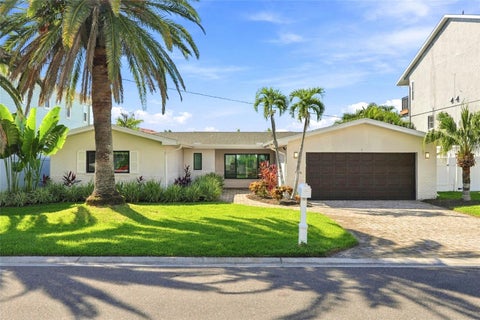 Photo of 556 Johns Pass Avenue, Madeira Beach, FL 33708 (MLS # TB8559543)