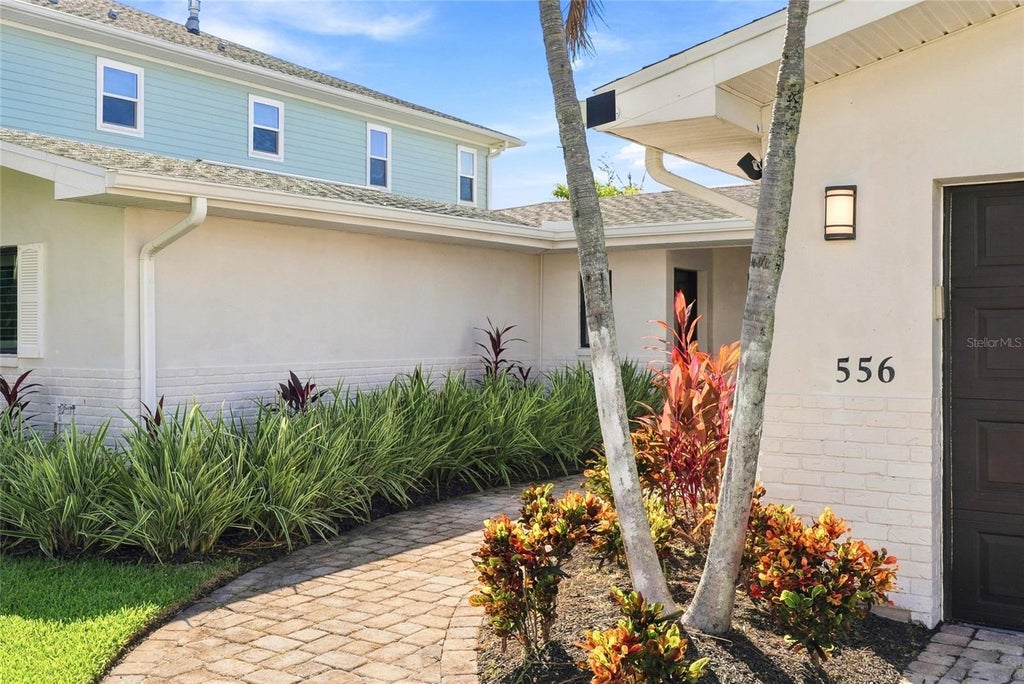 Photo of 556 Johns Pass Avenue, Madeira Beach, FL 33708 (MLS # TB8559543)