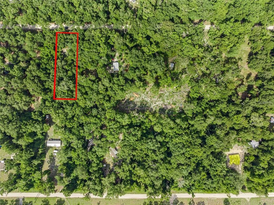 Welcome to North Central Florida!  This naturally wooded lot is located in Three Rivers Estates in Fort White recognized for River life – swimming, canoeing, kayaking, fishing, enjoying the beauty along the Santa Fe & Itchetuknee Rivers.  With access to 13 private parks & boat ramps just ride your golf cart around waving to the neighbors as you pass by.  Build or set up your dream home on almost a full acre.  Also available is the vacant lot next door & 4 other lots with power, wells & septic systems for 6 total connecting lots.
