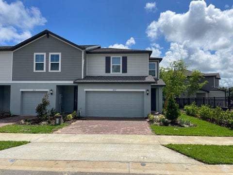 Photo of 407 Legacy Loop, Davenport, FL 33896 (MLS # O6427736)