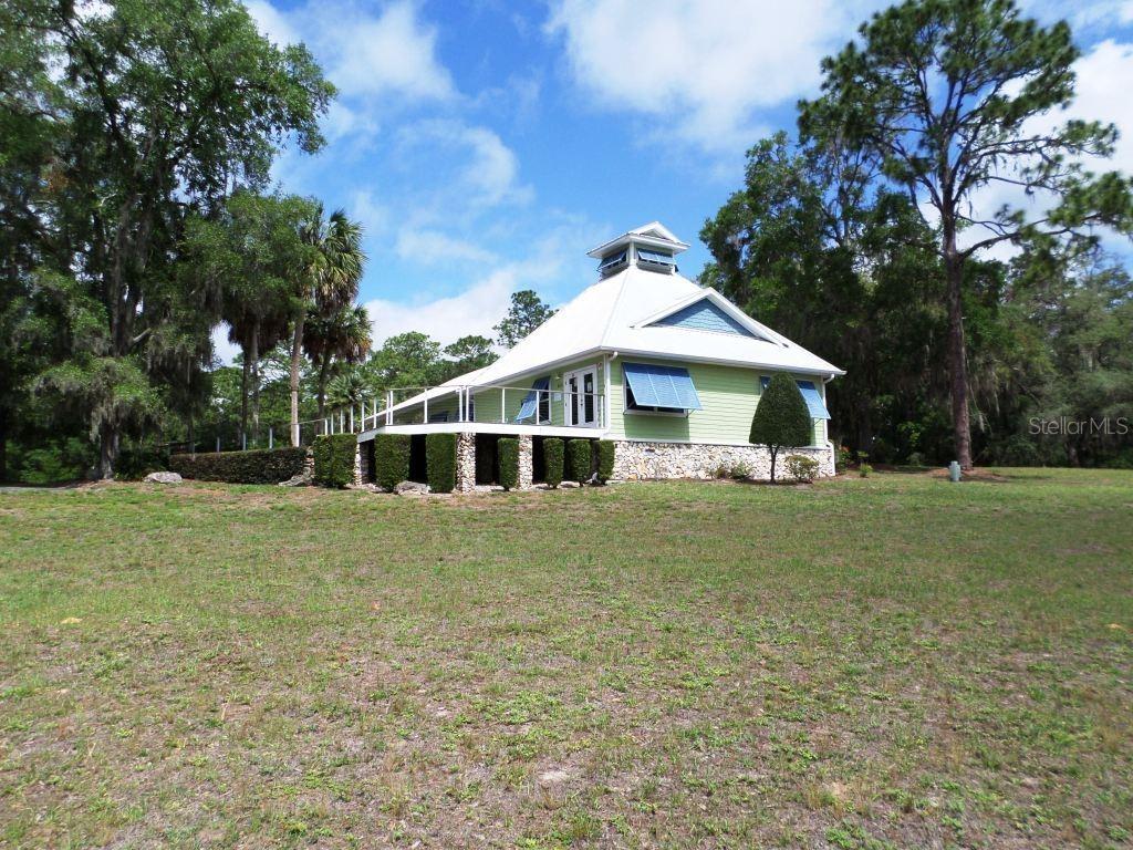 Photo of 8621 SW 200th Cir, Dunnellon, FL 34431 (MLS # OM728047)